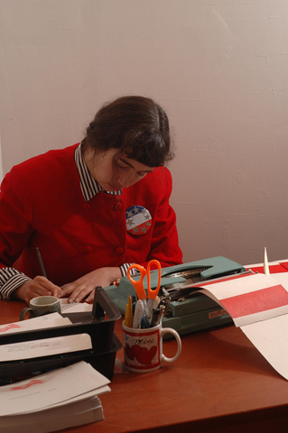 Candida filling out paperwork